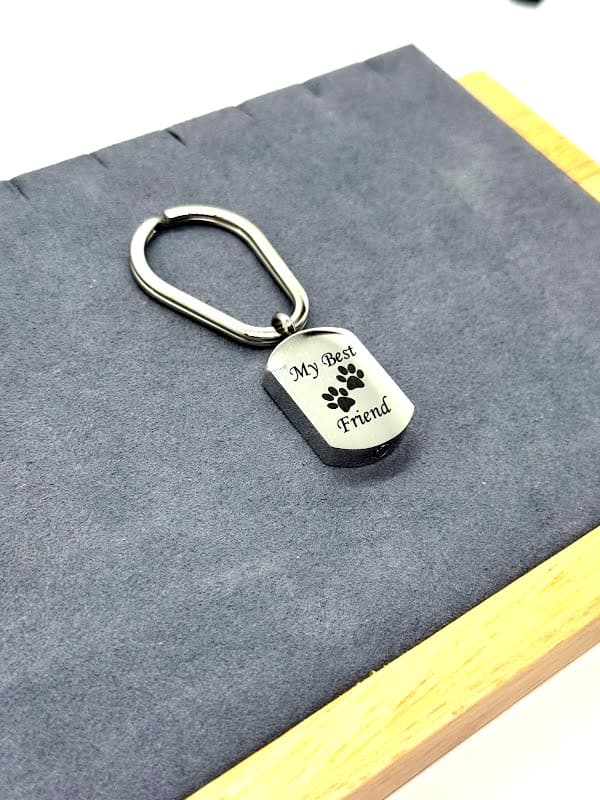 Silver keychain with "My Best Friend" motif.