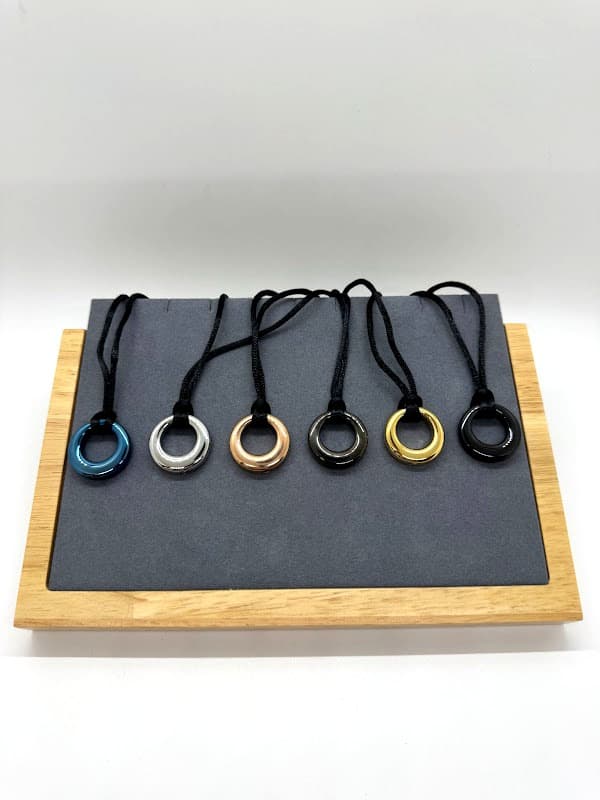 Circle of Life necklace. Available in blue, silver, rosegold, gunmetal, gold, and black.