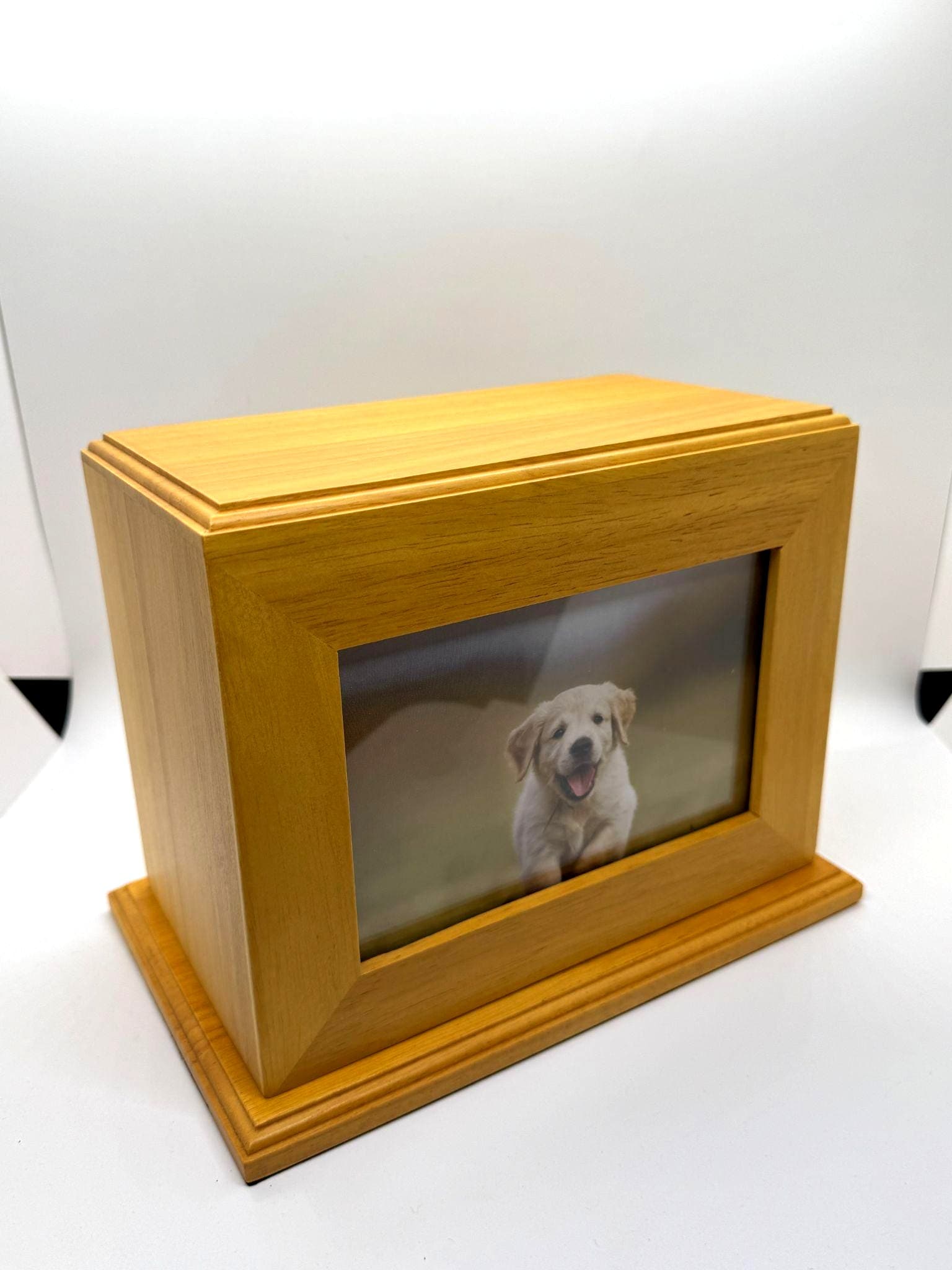 Maple wood photo urn with frame window in landscape orientation.
