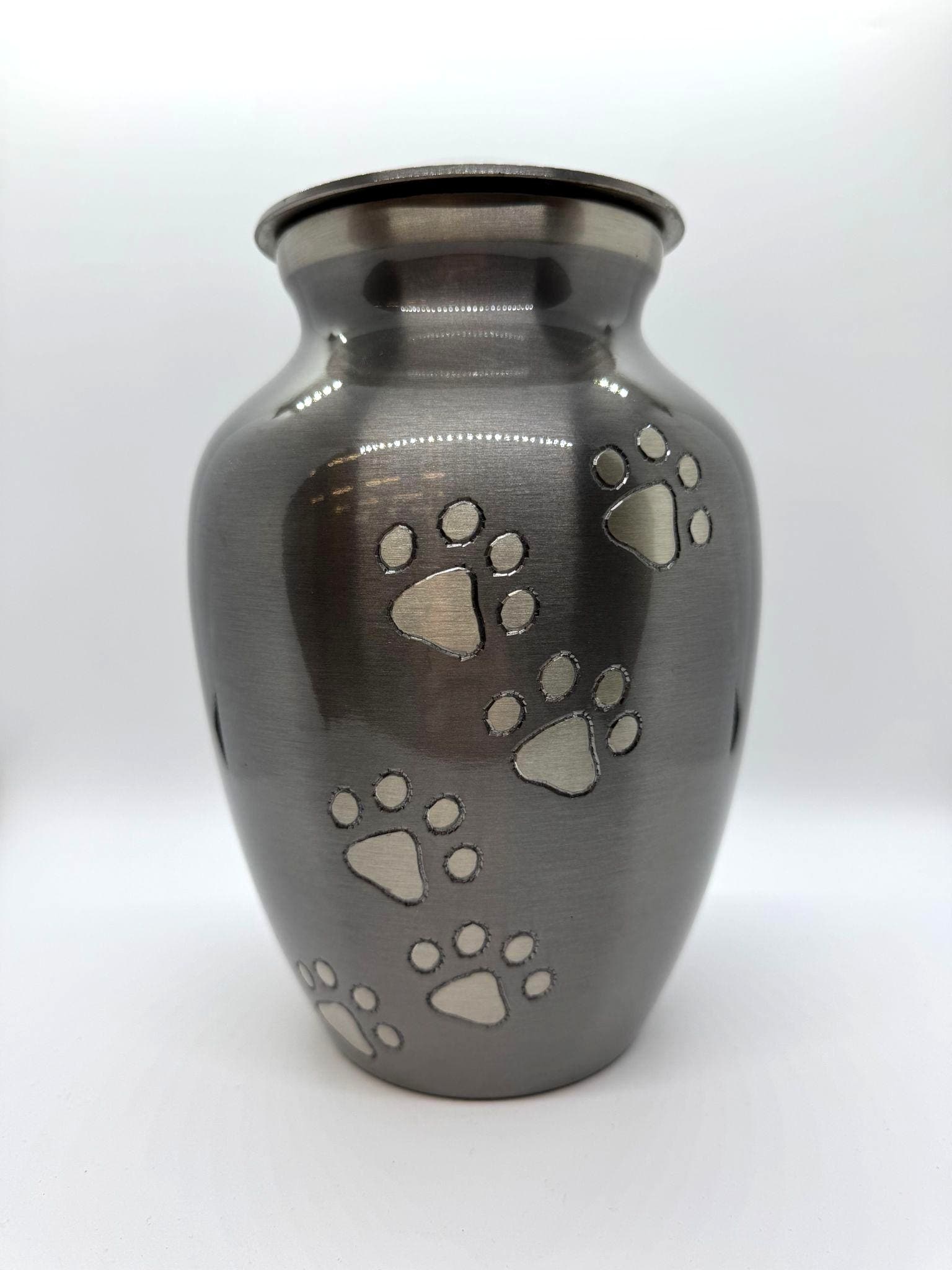 Slate-finish urn with silver paw print accents from the Paws to Heaven collection.