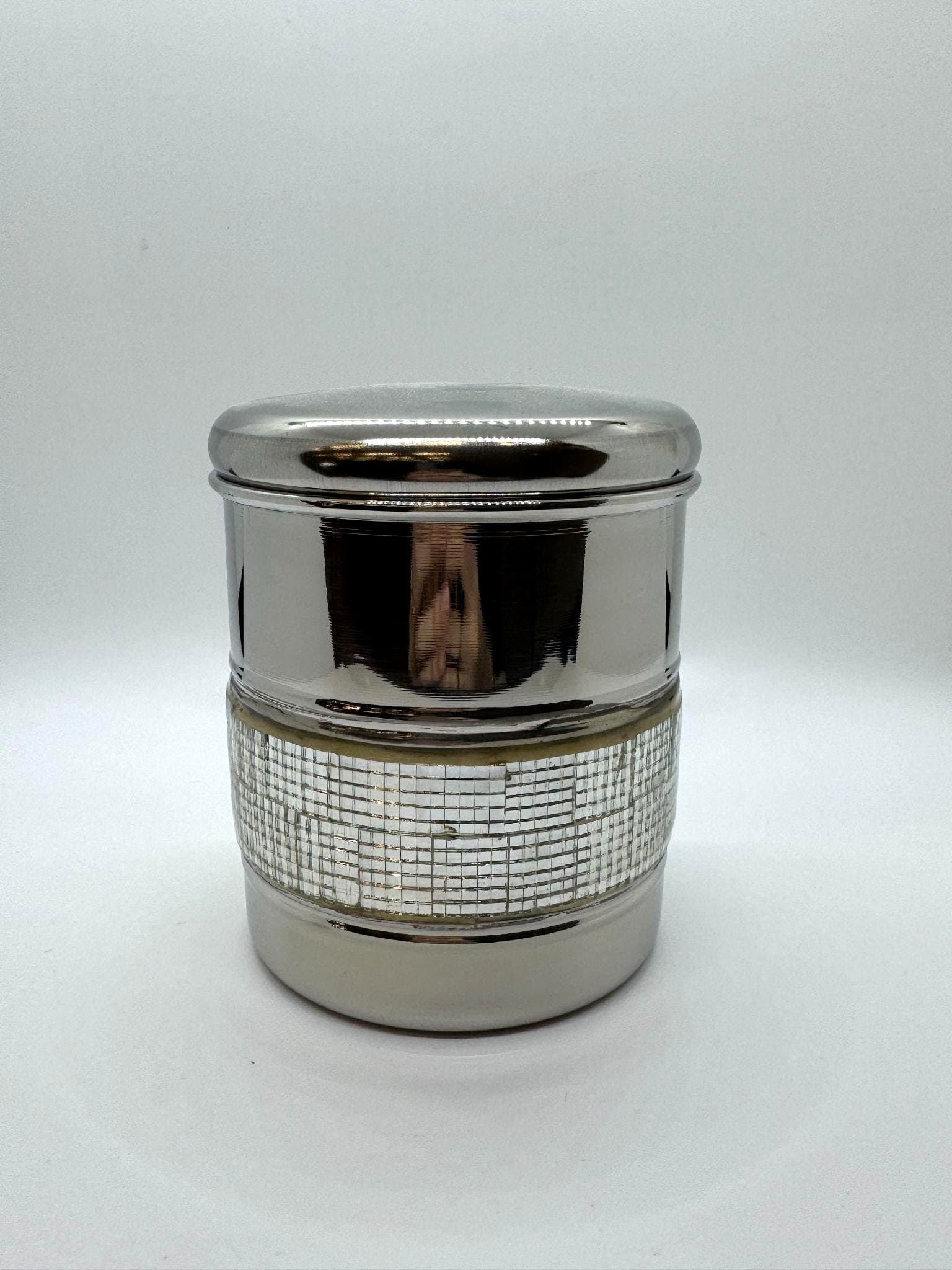 Silver canister urn with crystal-accented band.