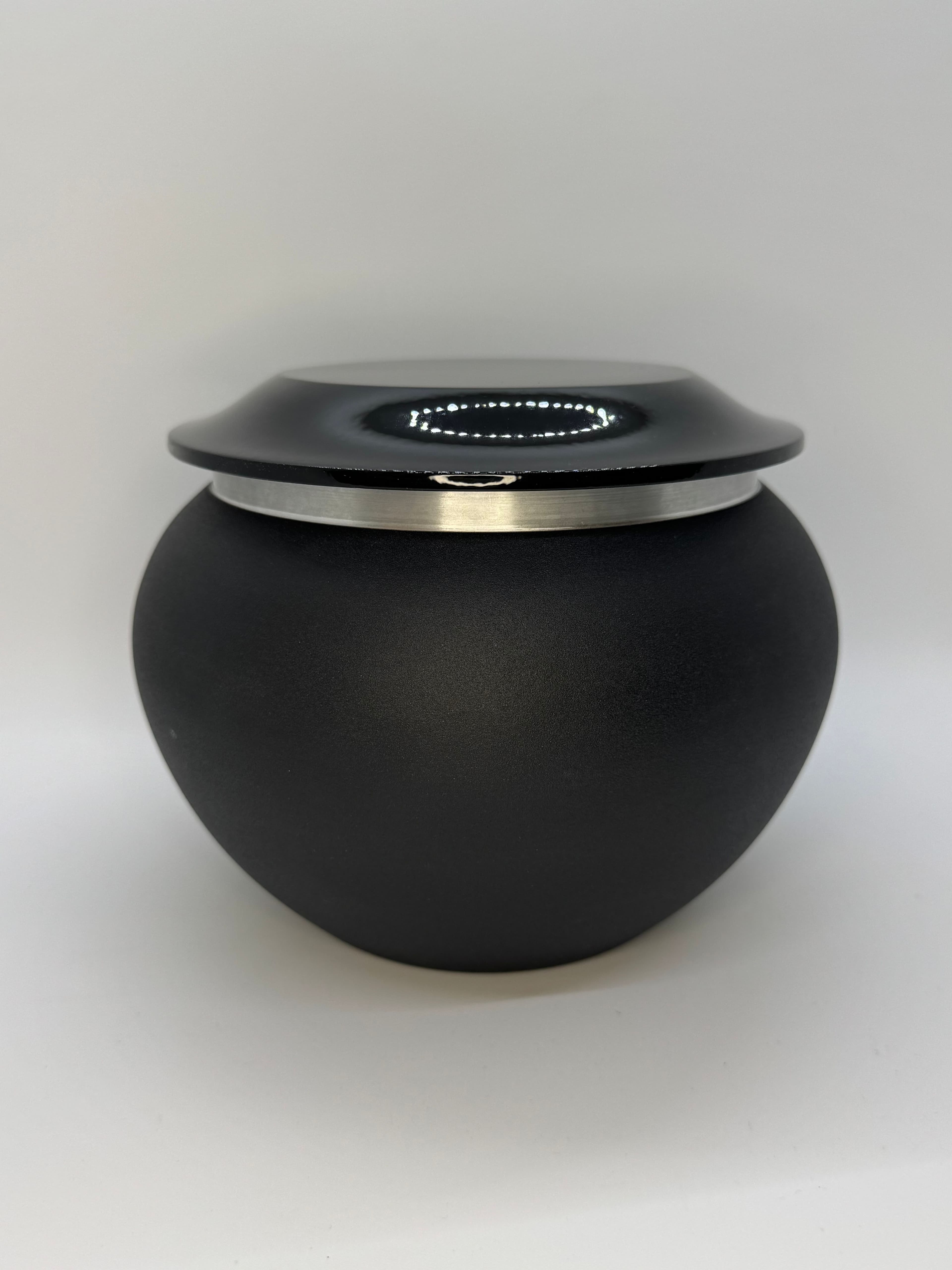 Black onyx finish pagoda-style urn.